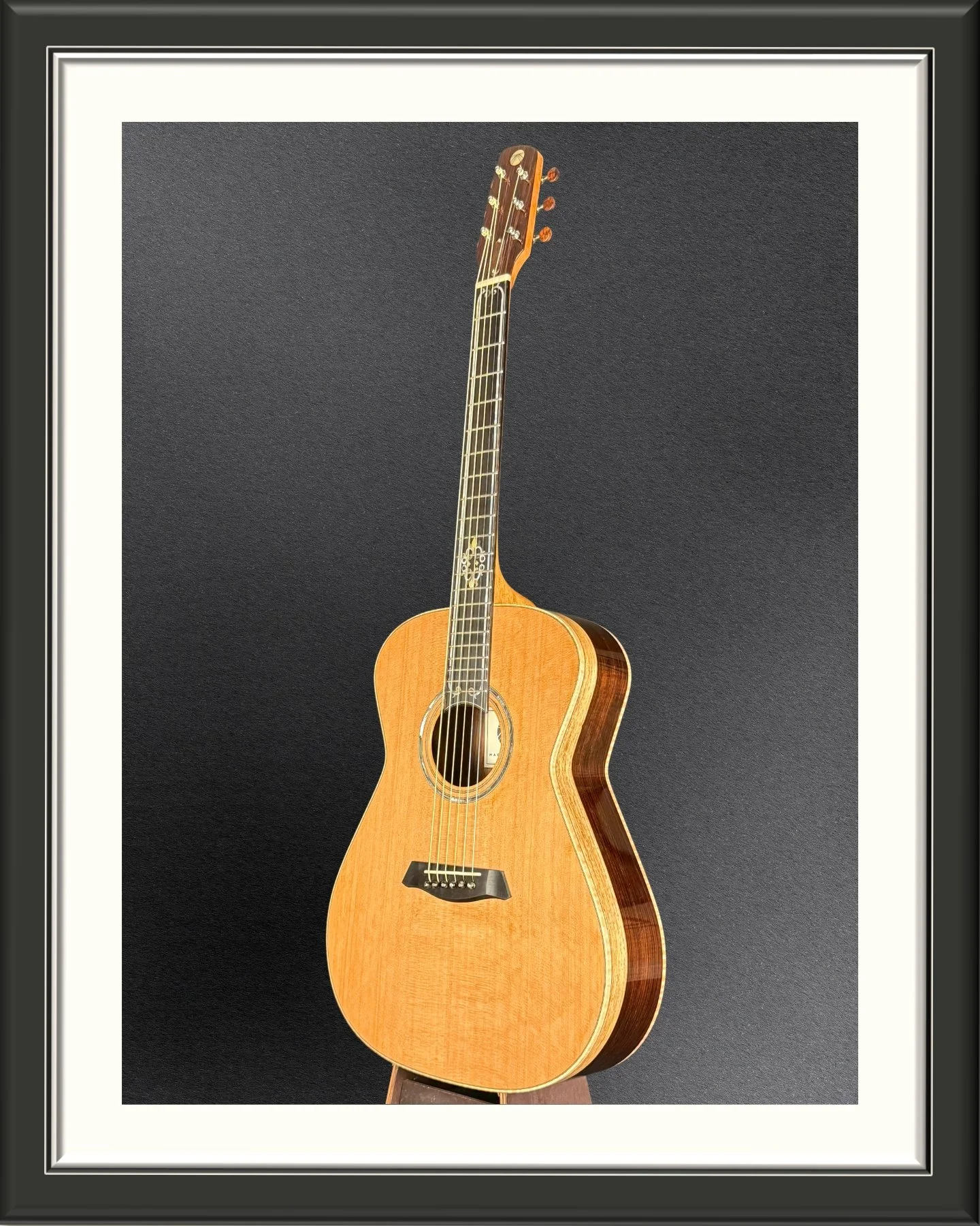 Full image of the ECA custom acoustic guitar with Western Red Cedar top, facing to the left