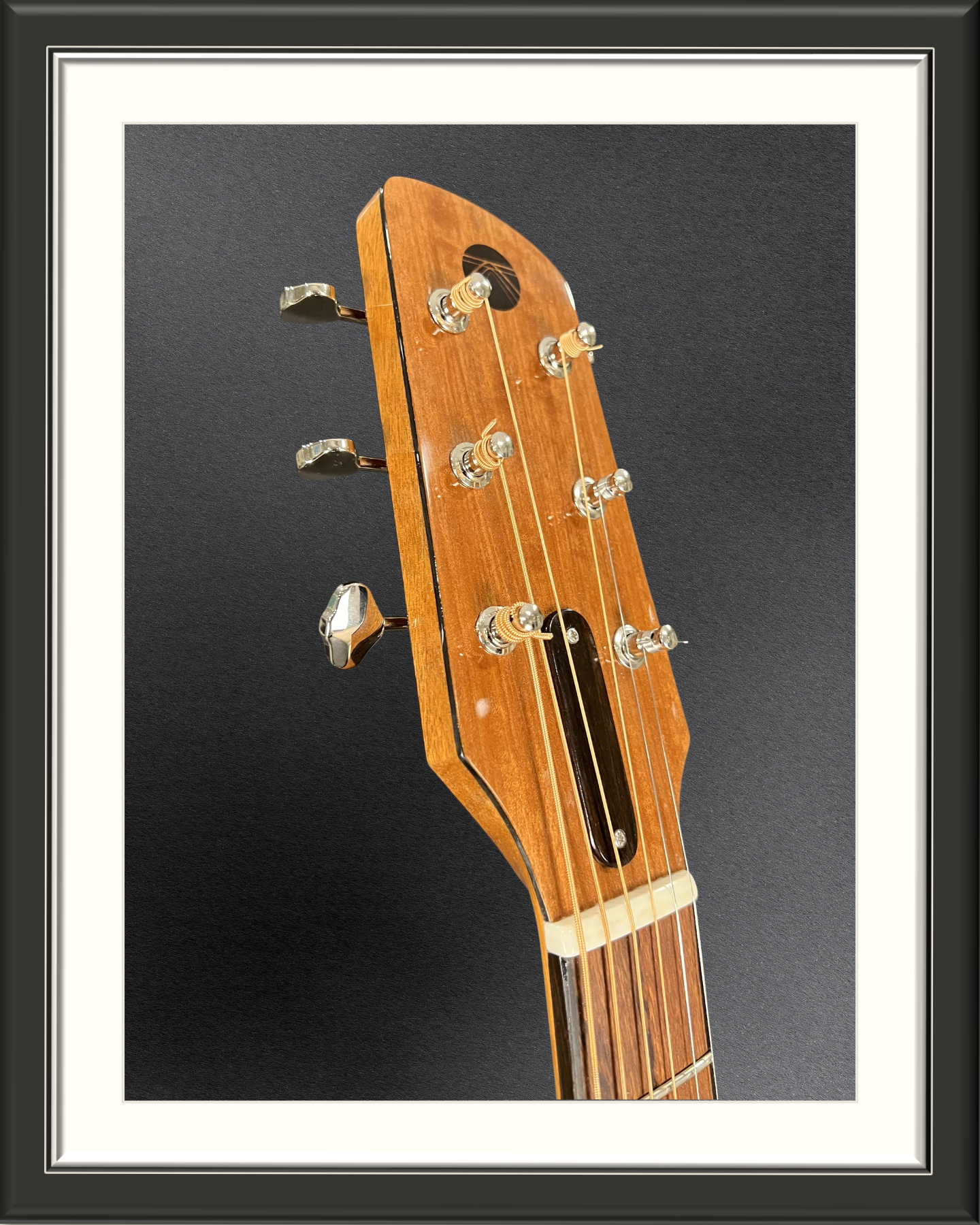 MachMachines Plymouth Model Acoustic Guitar in Honduran Mahogany_headstock front angle
