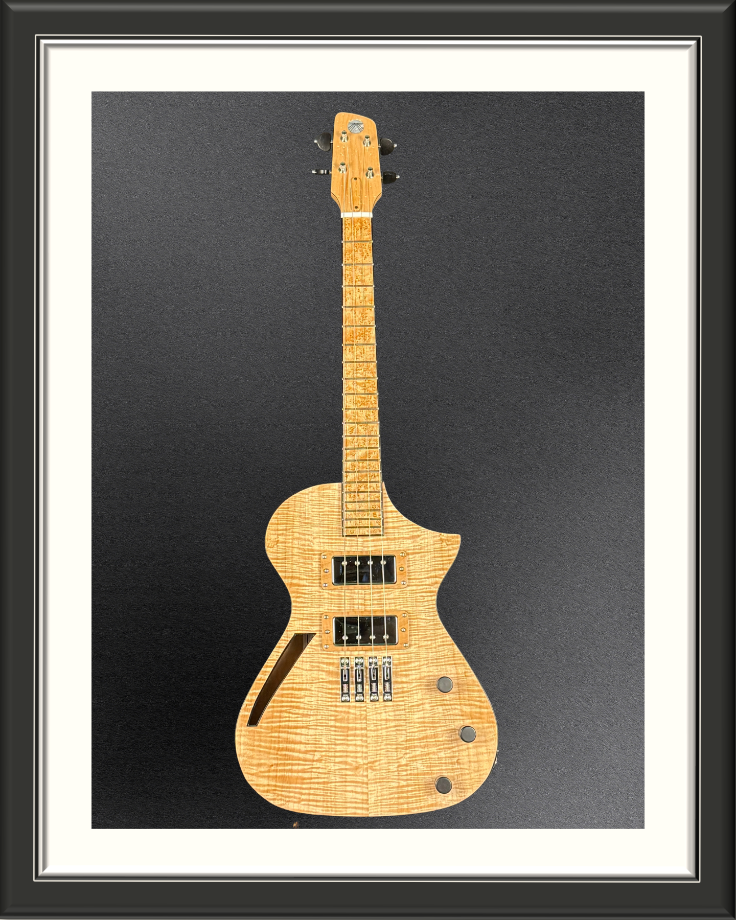 Front of the MachMachines Cuyler Model all-maple, hollow-body, electric baritone ukulele