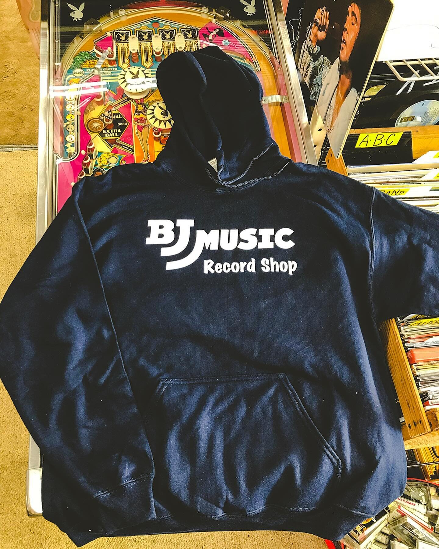 New hoodies just drip dropped over at BJ Music. These photos are heavily edited for stylistic purposes but you should know two things:
1. The hoodie is navy blue and super comfy and 2. We don&rsquo;t know what double entendre means.