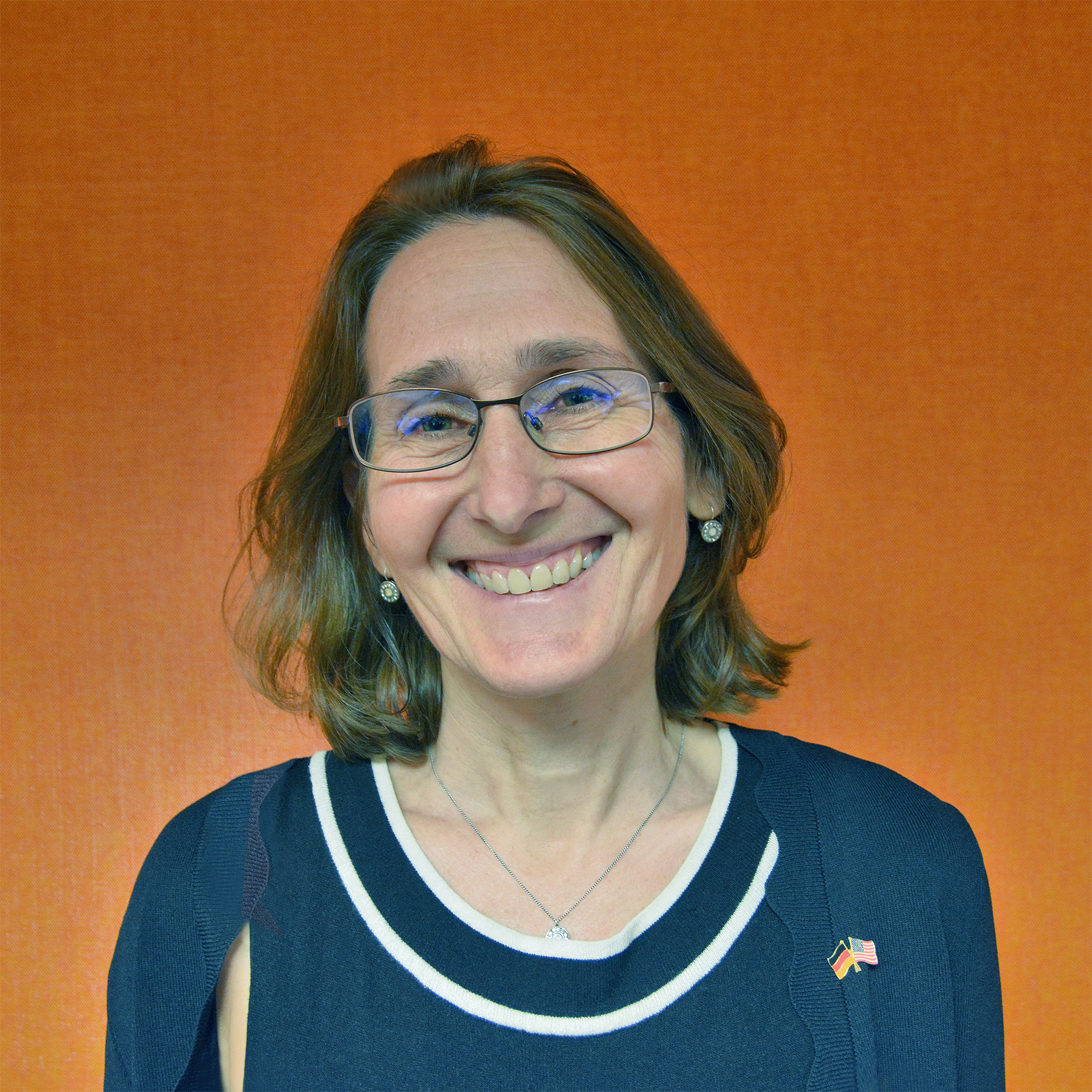Orange Embassy Female w Glasses SQUARE 2000.png