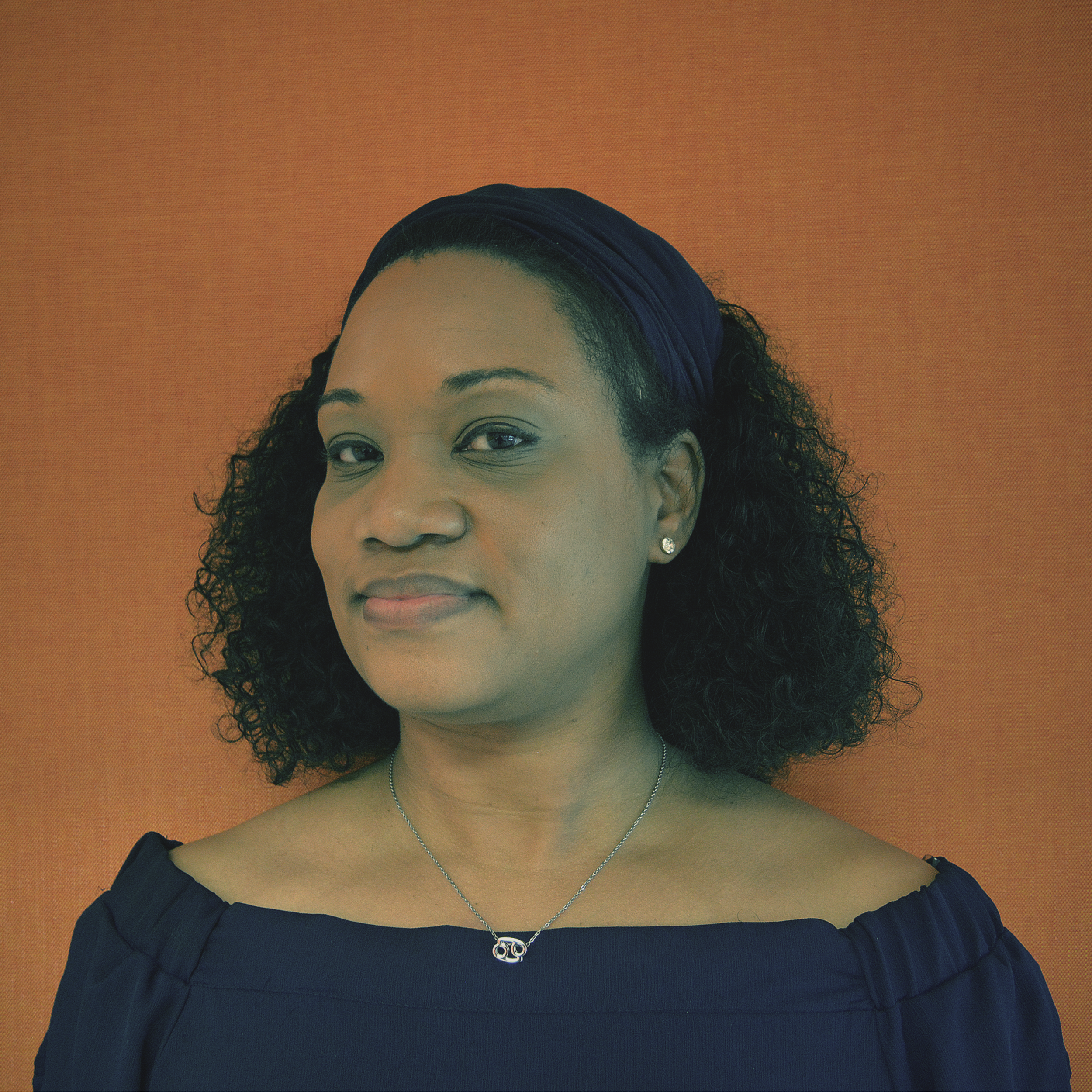 Revolutionry Ed Blk Female Curls 2 No smile SQUARE.png