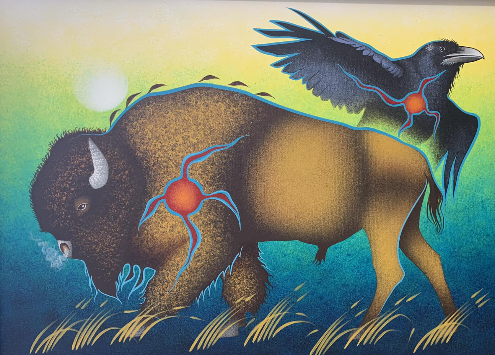 Illustration of a bison with blue and red lines running through its body, highlighting its nervous system, and a black bird with blue and red lines flying above it, set against a gradient background of yellow, green, and blue.