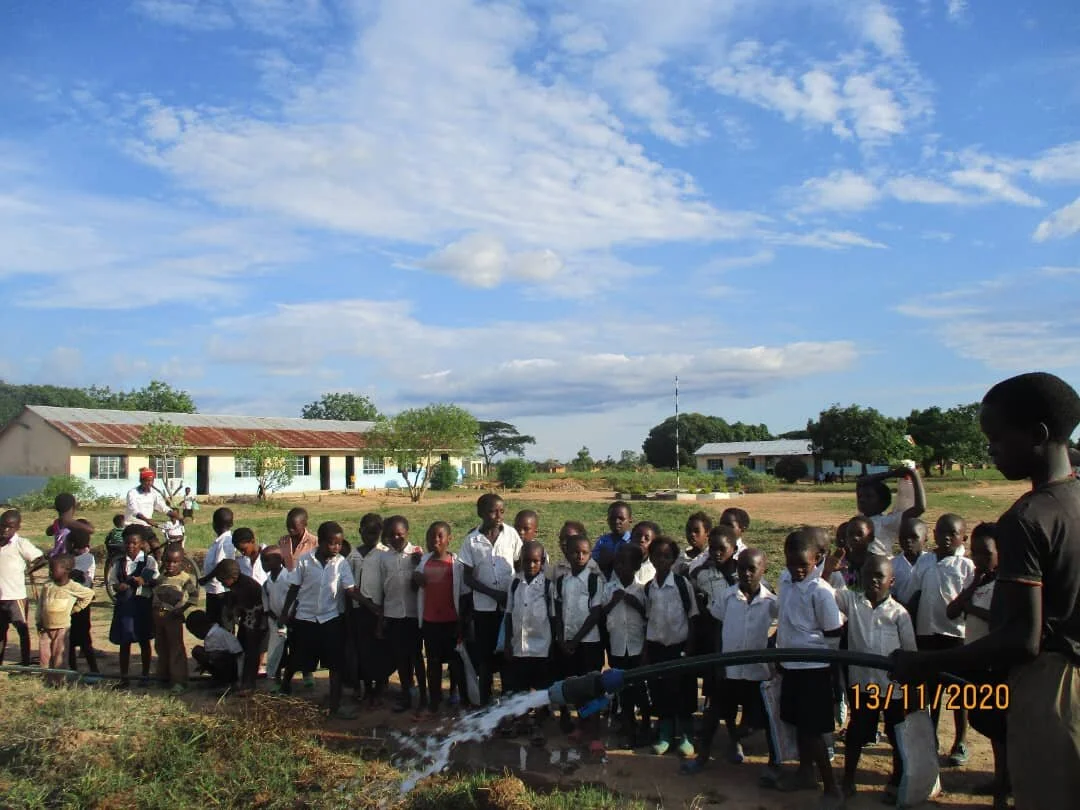 School children watching water.jpeg
