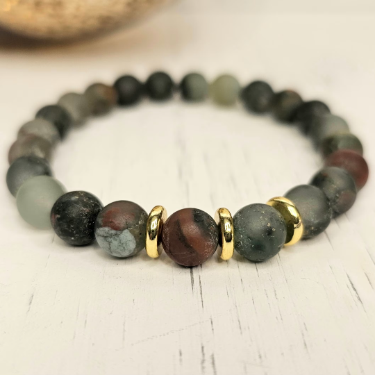 African Bloodstone bracelet featuring 18k gold plated accents.