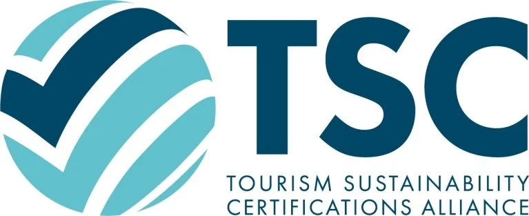 TSC logo with a globe and check marks, representing Tourism Sustainability Certifications Alliance.