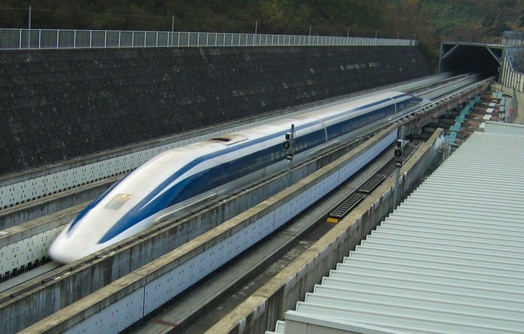 Imagine rushing across the Japanese countryside at astonishing speeds. The wheels of your vehicle do not even touch the ground. In fact, you’re floating! This dreamlike experience will soon be a reality thanks to Japan’s famous Maglev bullet trains,
