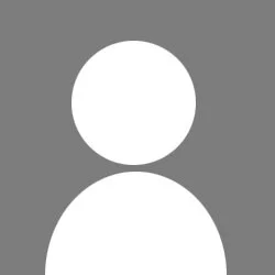 Icon of a person with a circular head and shoulders.