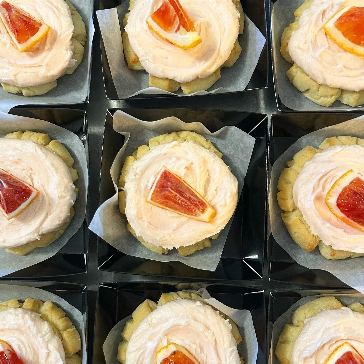 sugar cookie with citrus frosting + blood orange wedge for squeezing over the top.

happy friday!!