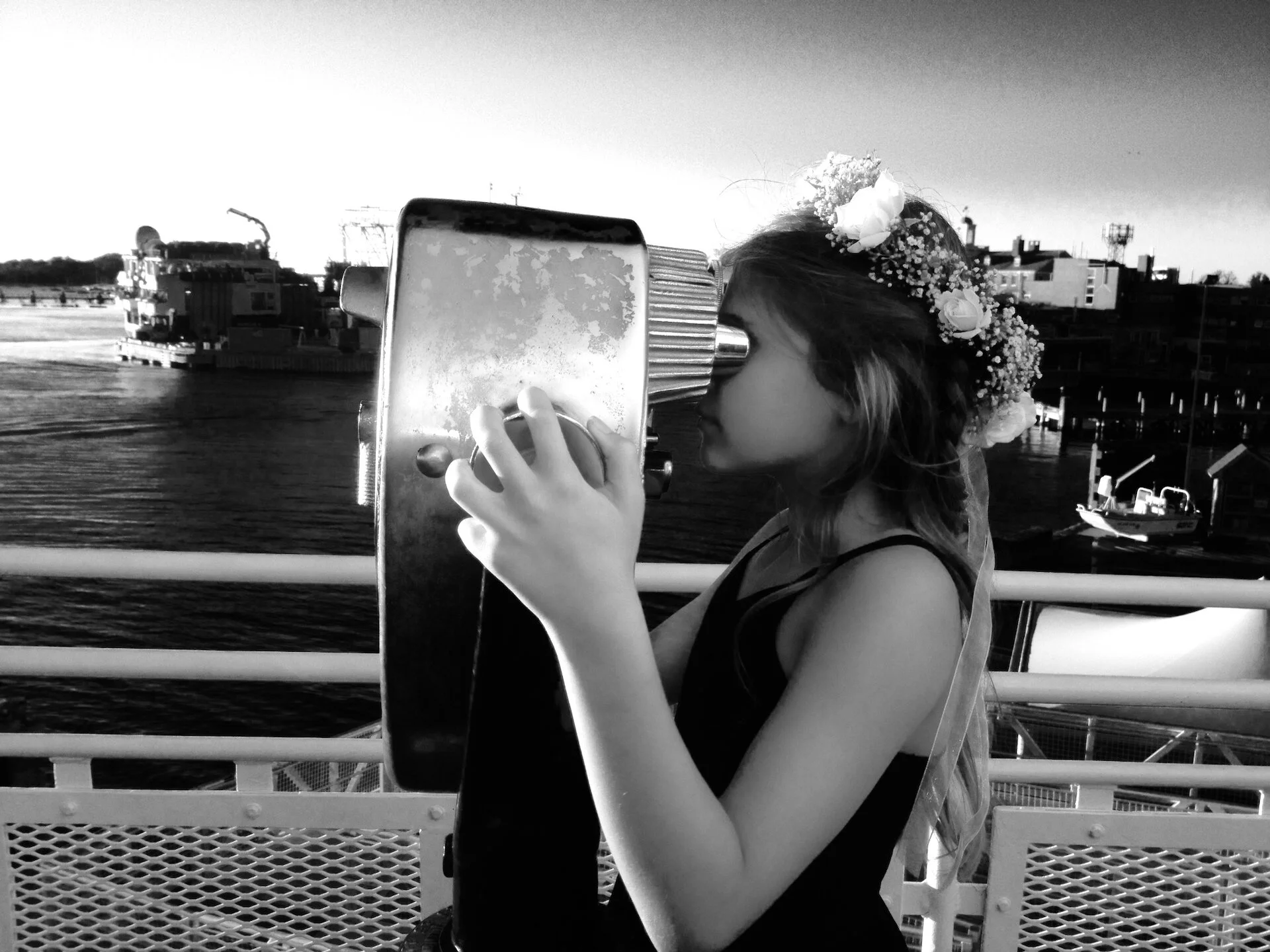 Girl looking out spyglass on Marthas Vineyard.JPG