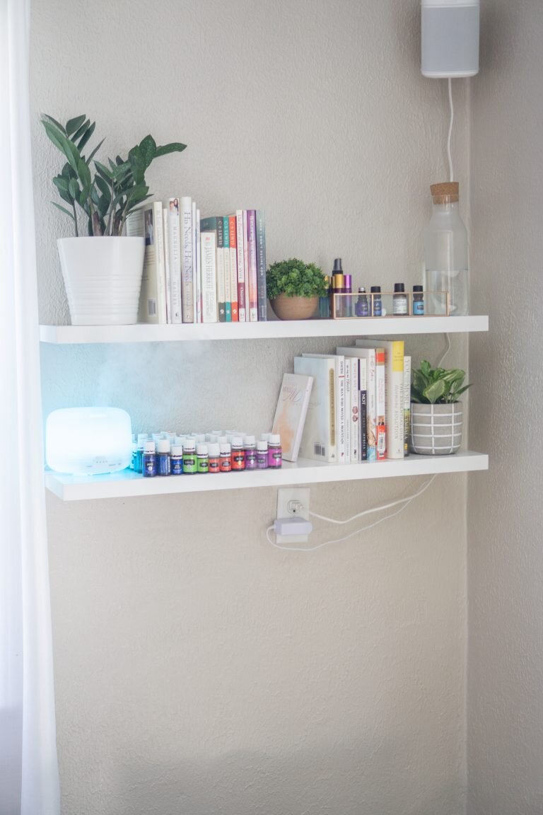   I installed the first two shelves while Josh was at work and just let them like that for a few days to make sure i want to add another one.  