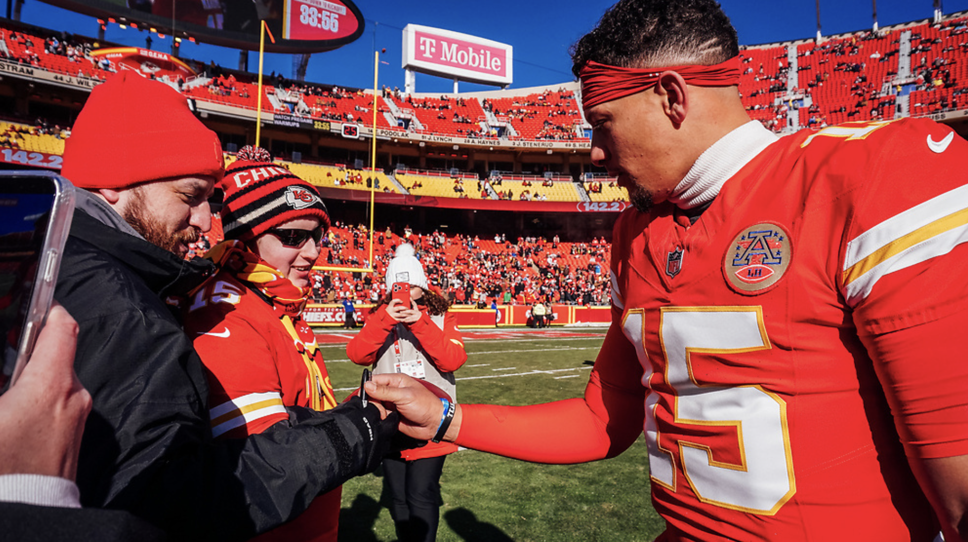 Bradley meeting Patrick Mahomes on the sidelines of a Kansas City Chiefs Game
