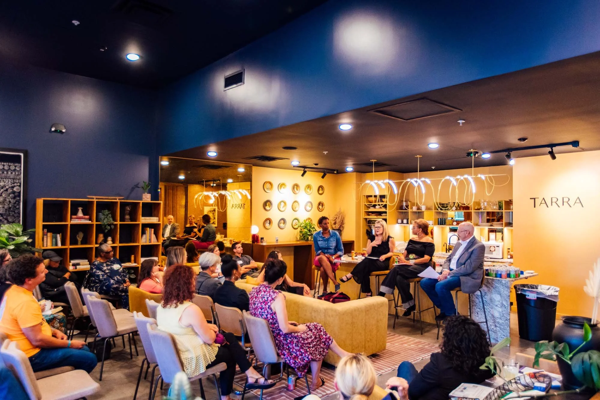 Crowd Watches pannel including Chelle Johnson and Barbara Brooks at Colorado Startup Week