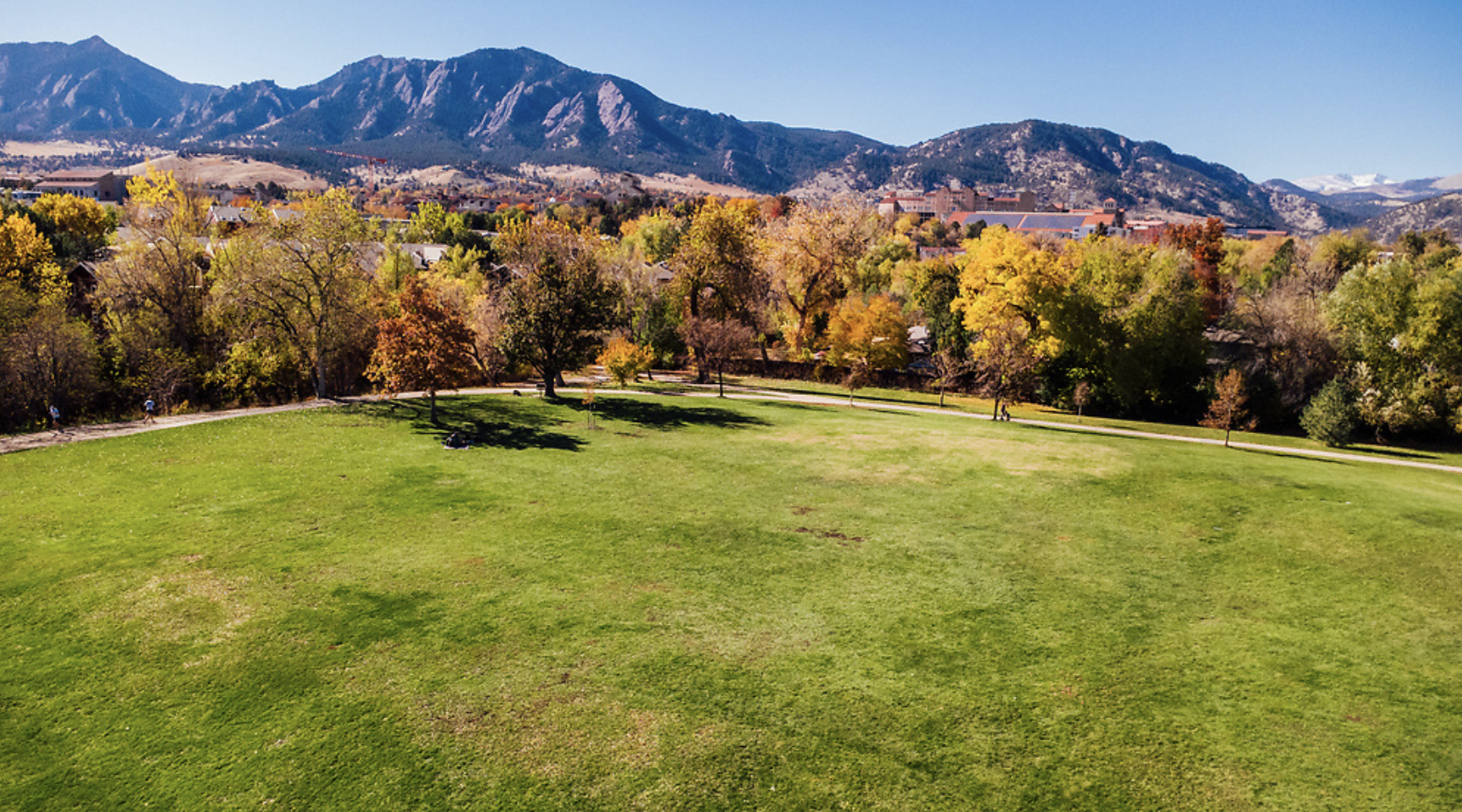 Mountains behind fall foliage in Boulder, CO