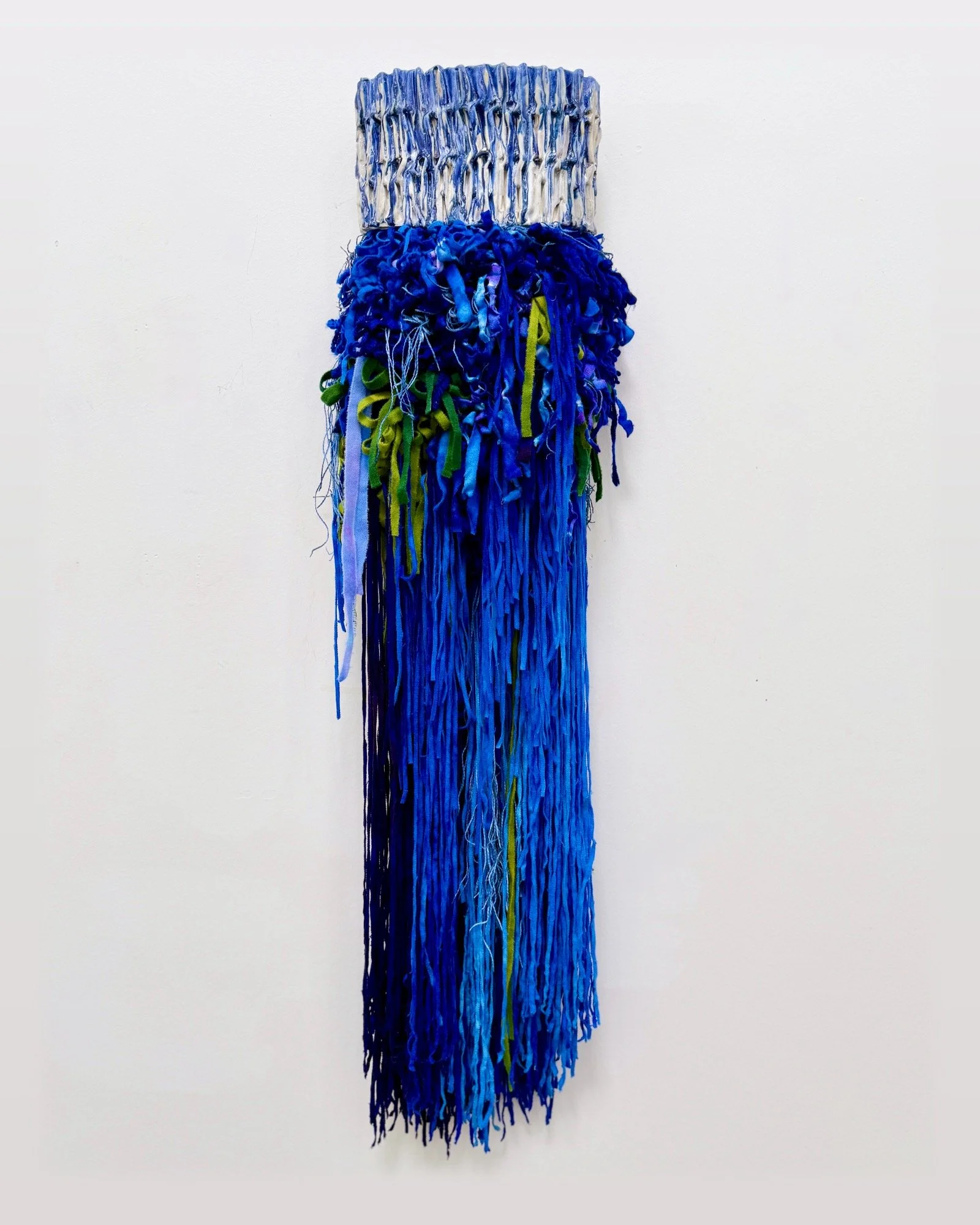 LET IT GO, 13 x 46 x 6 inches, stoneware porcelain and mixed fiber, available