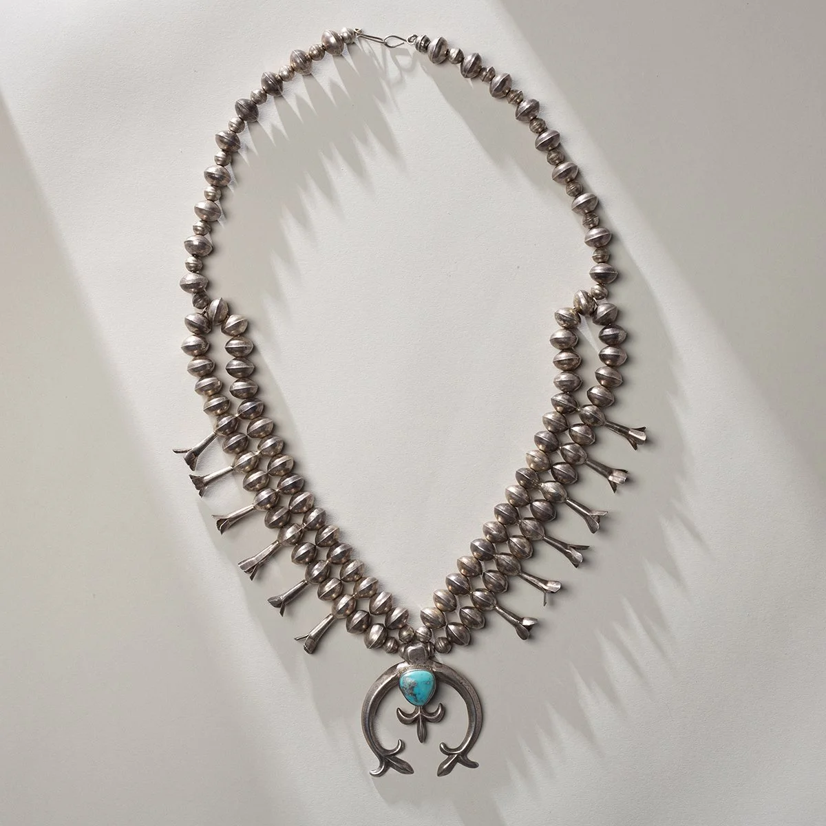 2239-Sand-Cast-Naja-Squash-Blossom-Necklaces-Pendants-Native-American-Jewelry-Art-Blackburn-1.jpg