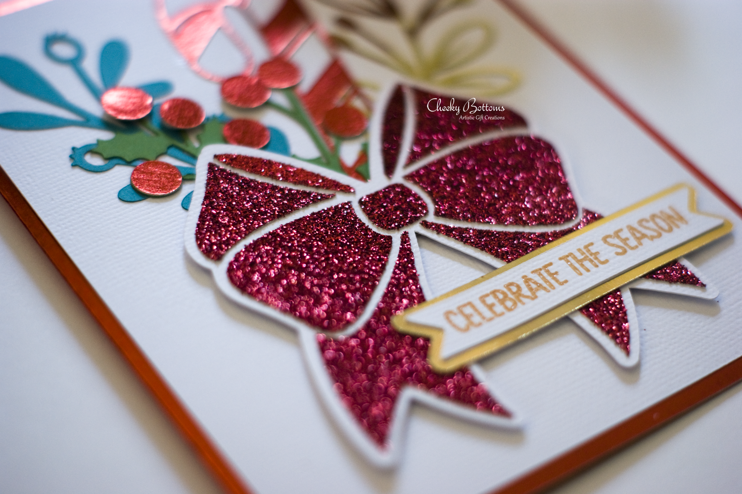Inspired by an image in Cricut's Design Space, I've recreated that image into a beautiful greeting card made with a combination of glitter and foil cardstock with lettering in glitter pens. 