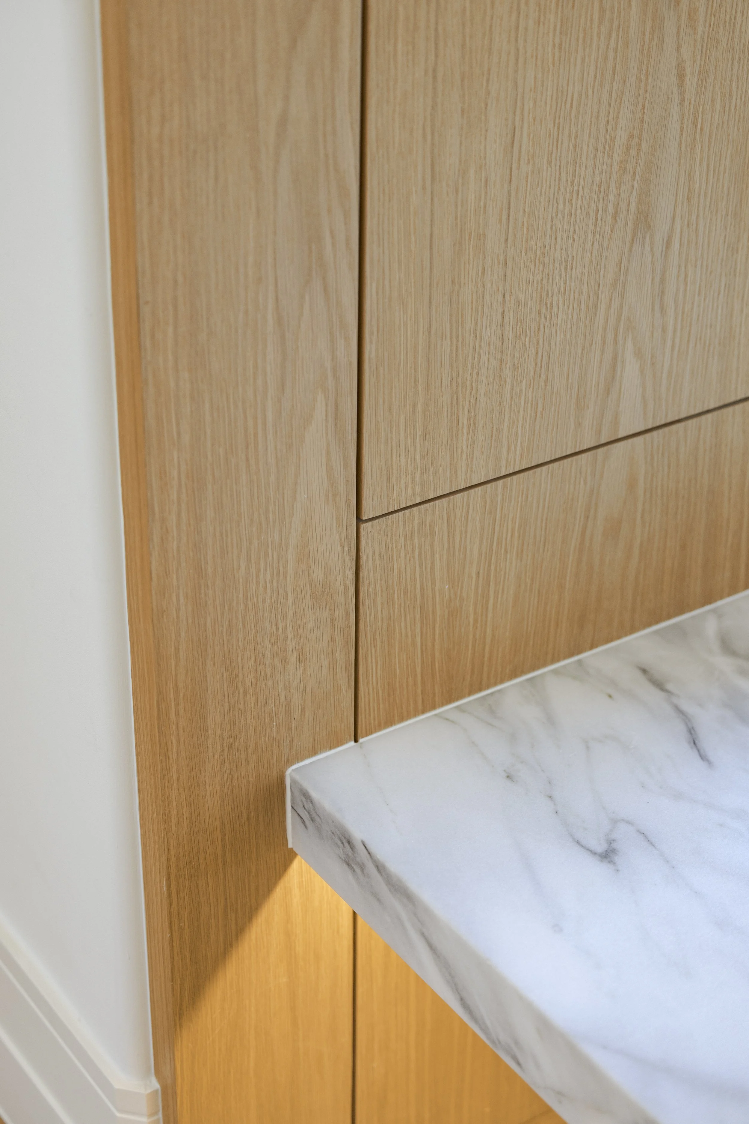 Custom cabinetry at entry drop zone