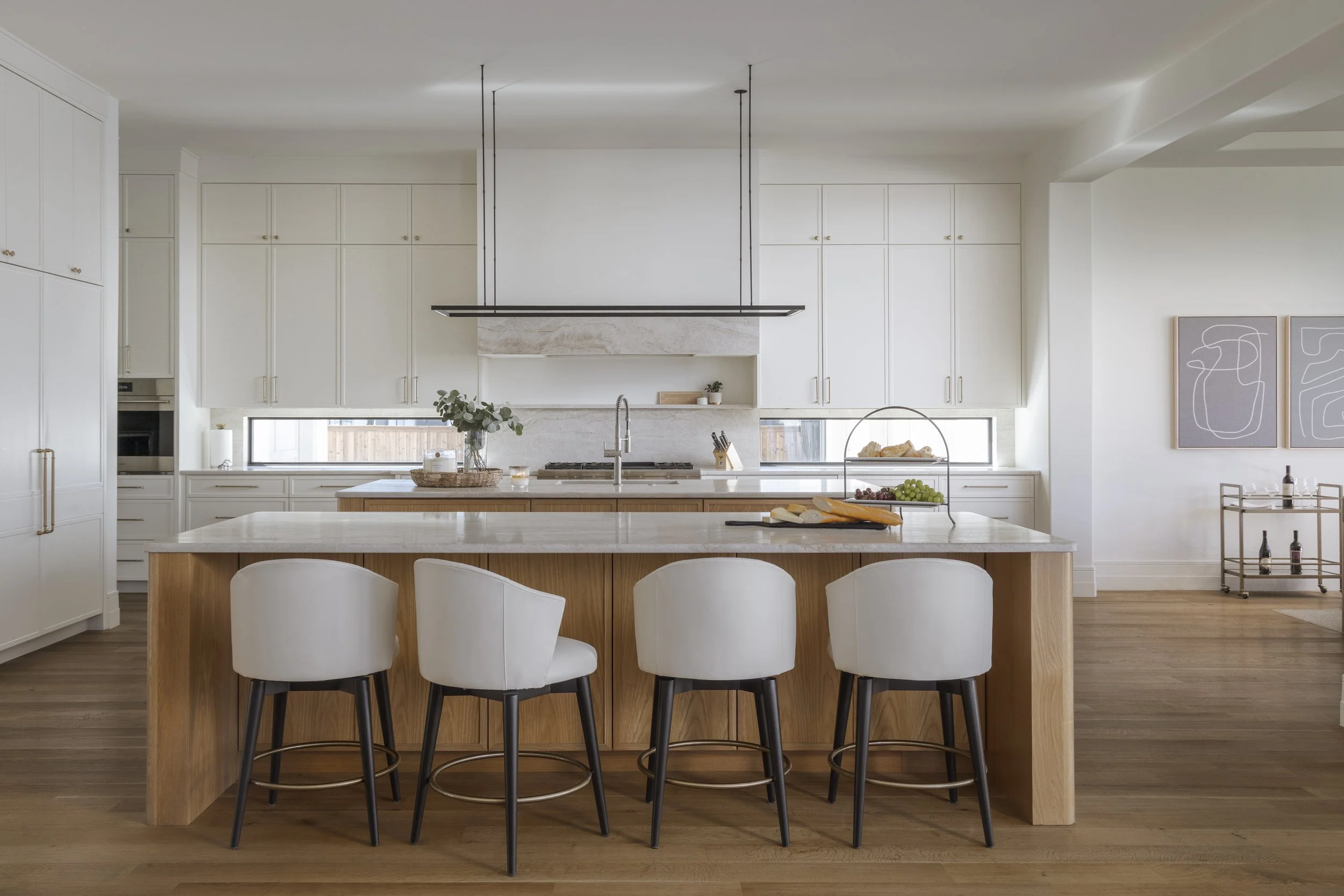 Double islands with custom cabinetry