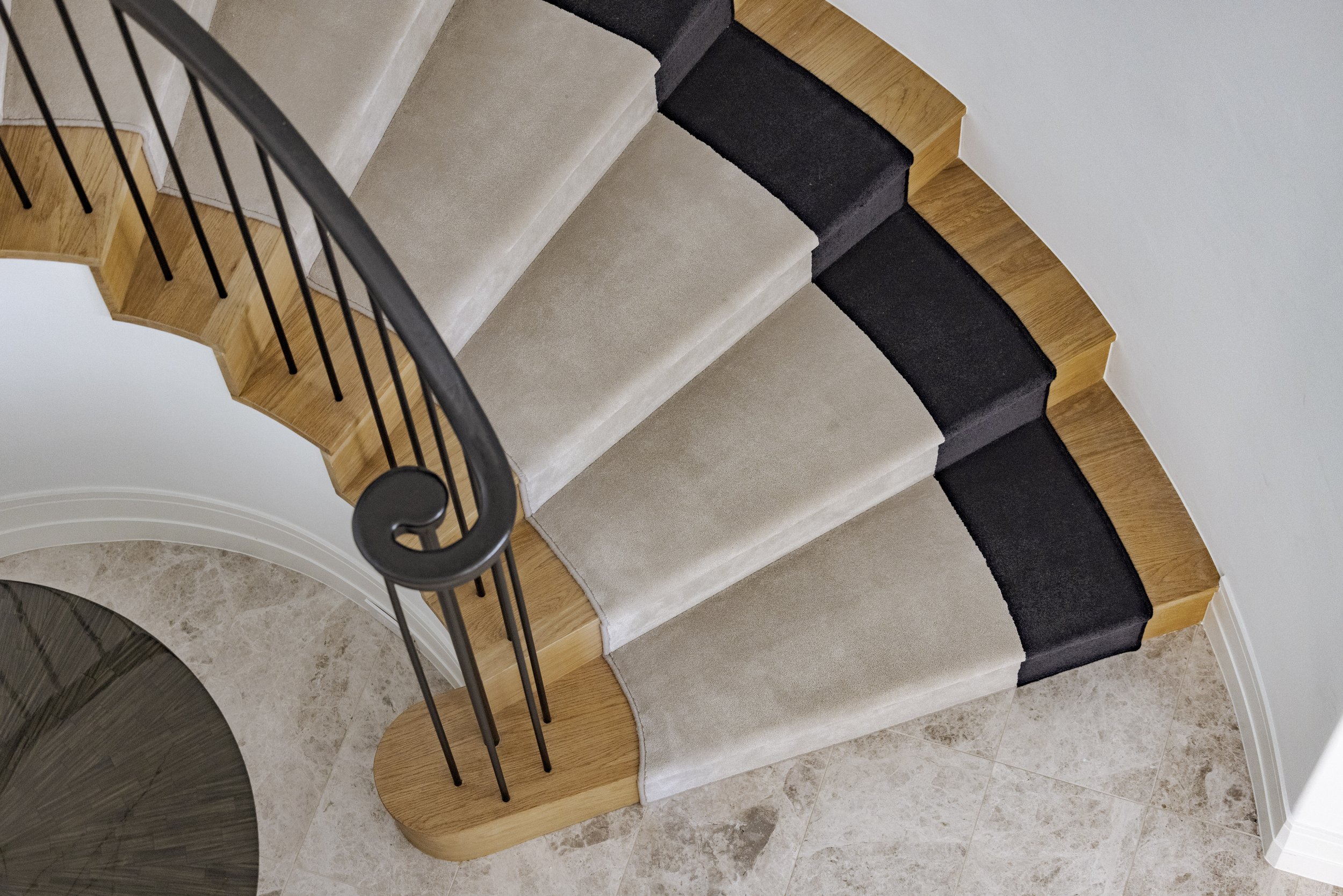 Curved Stairway Down View with Floor & Partial Table-Detail.jpg