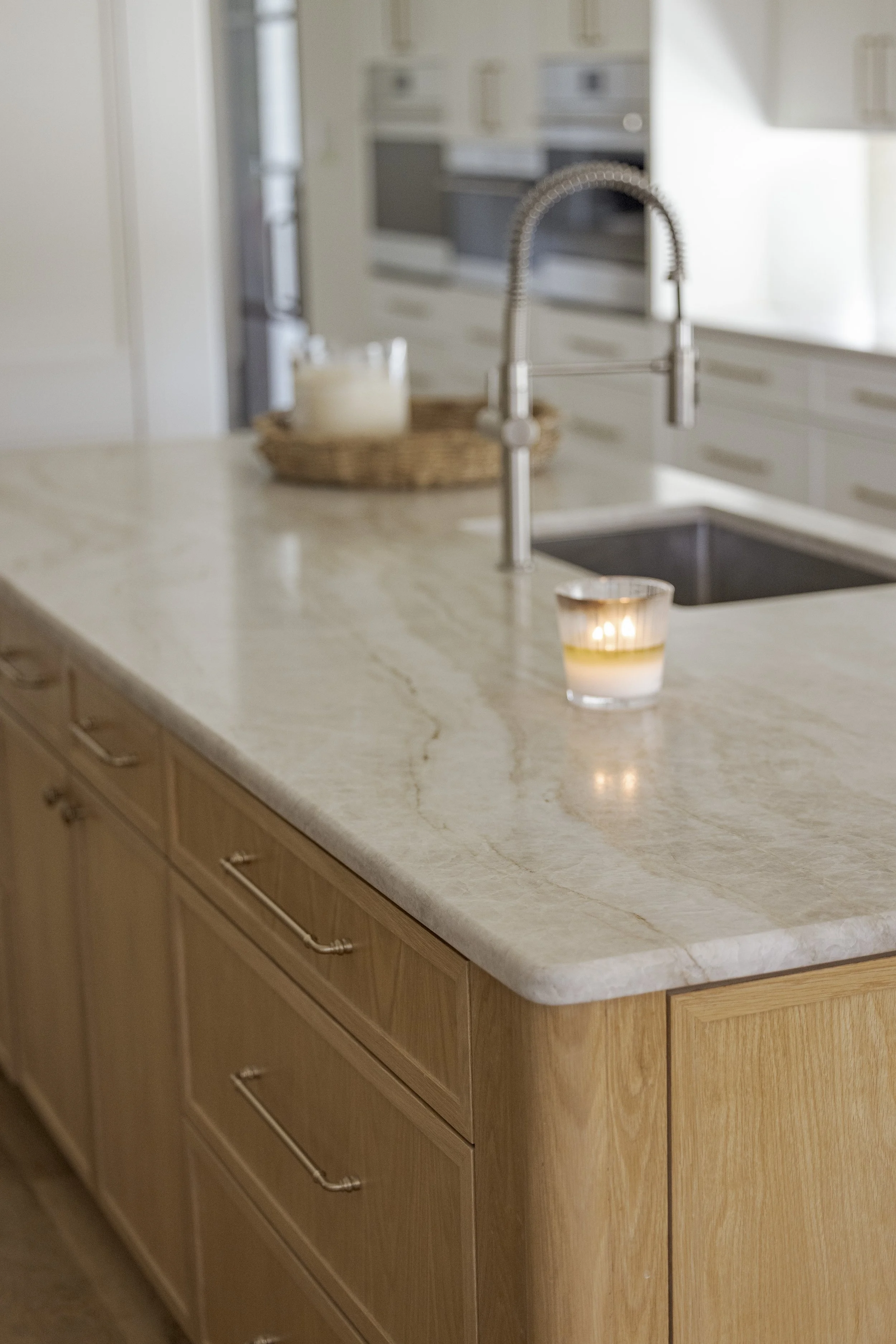 Custom cabinets on island with rounded corners