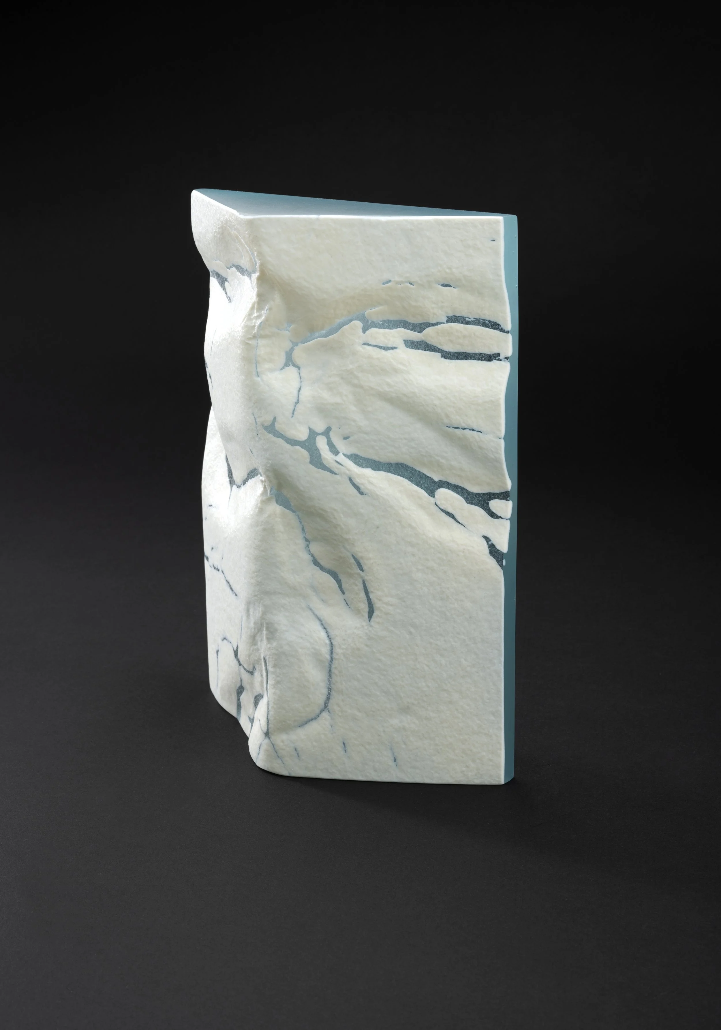 Glacialis Profundum (2023) Kiln Formed and Hand Ground Glass, 28 cm H x 20 cm W x 7 cm D (Side view)