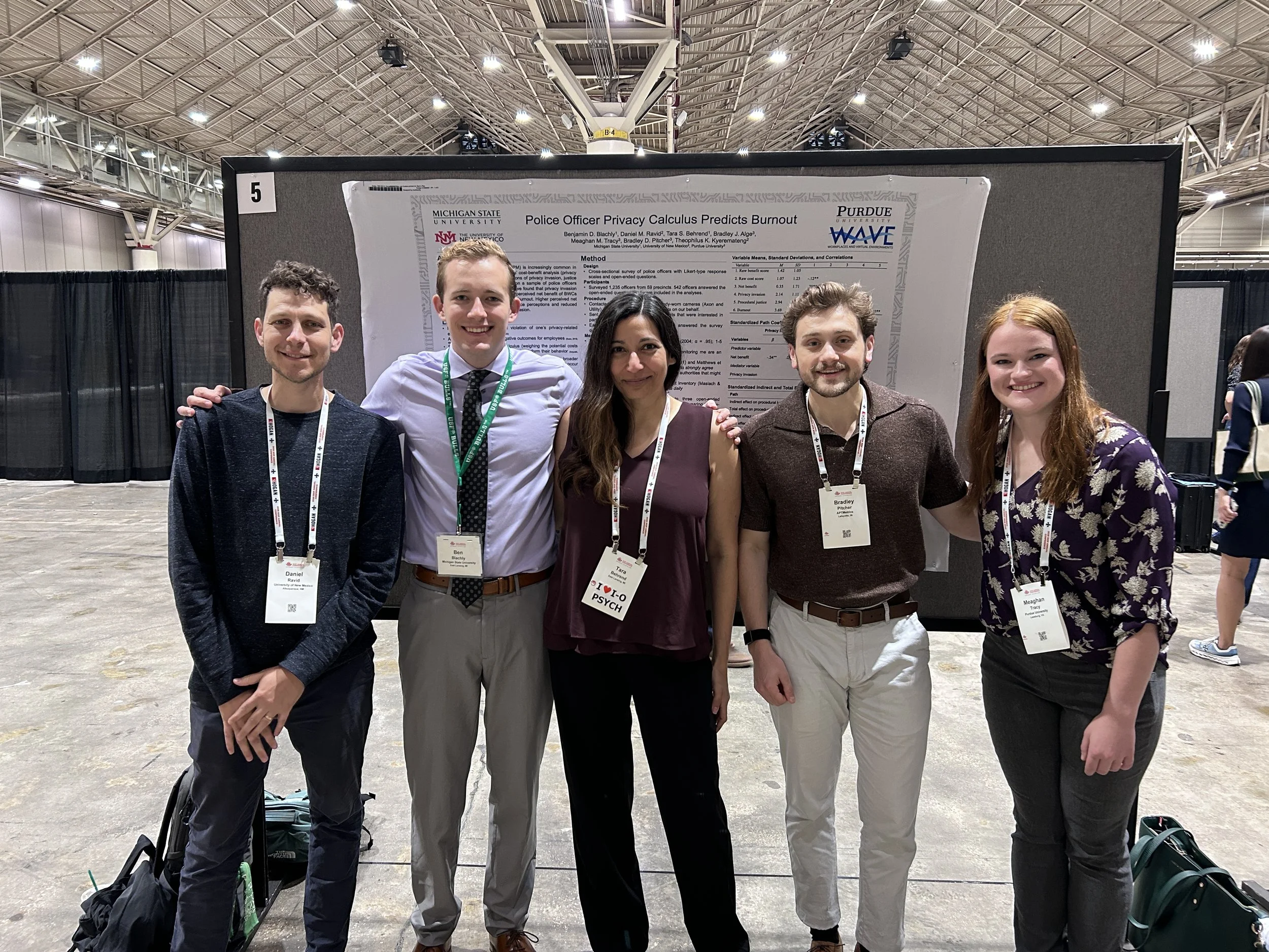 Ben Blachly, Meaghan Tracy, Brad Pitcher, Dr. Dan Ravid, and Dr. Tara Behrend present a poster at SIOP 2026.