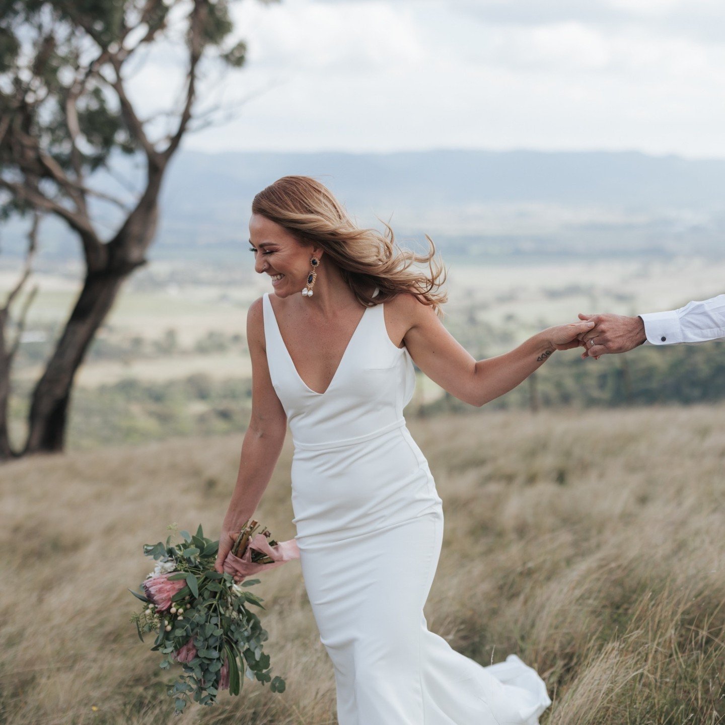 Grooving to the heart and soul of country charm, this funky duo brought their own wind swept rhythm to their perfect wedding day.