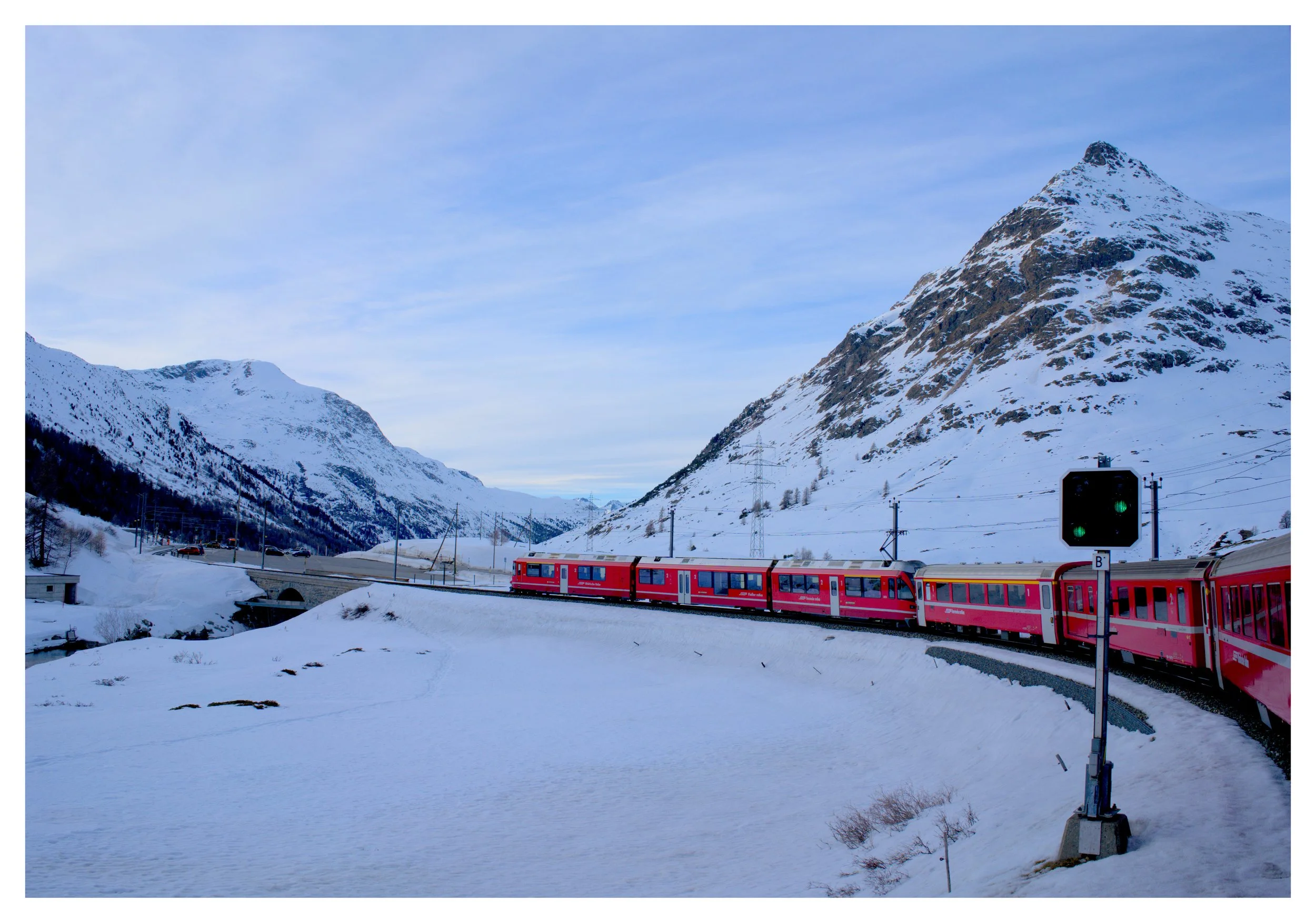 UNESCO Rhaetian Railway Albula/Bernina Express; Location@ Swiss Engadin Alps on the Lago Bianco (White Lake)