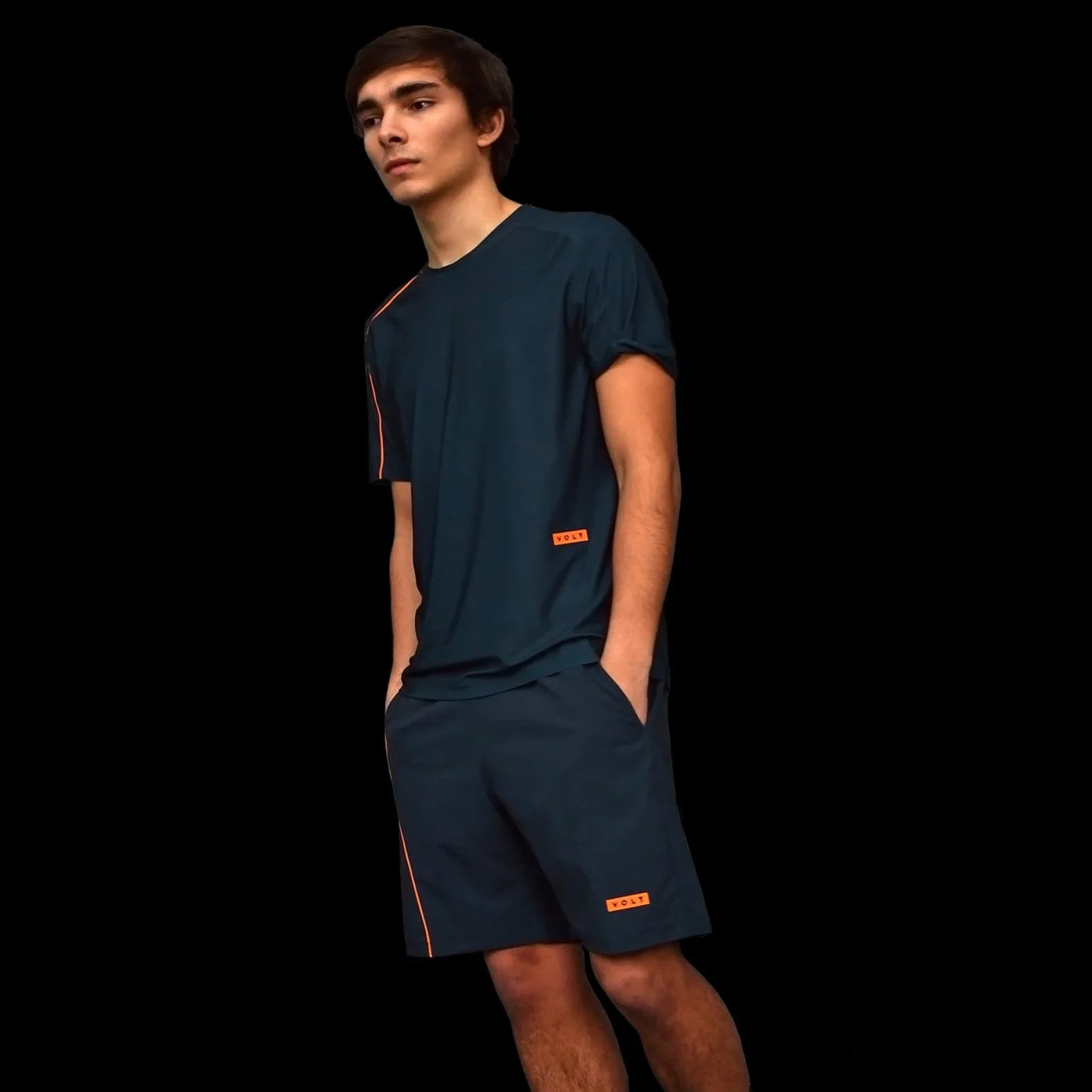 clothing-volt-performance-tshirt-blue-and-neon-orange-zoomed-full-body-angled-view.jpg