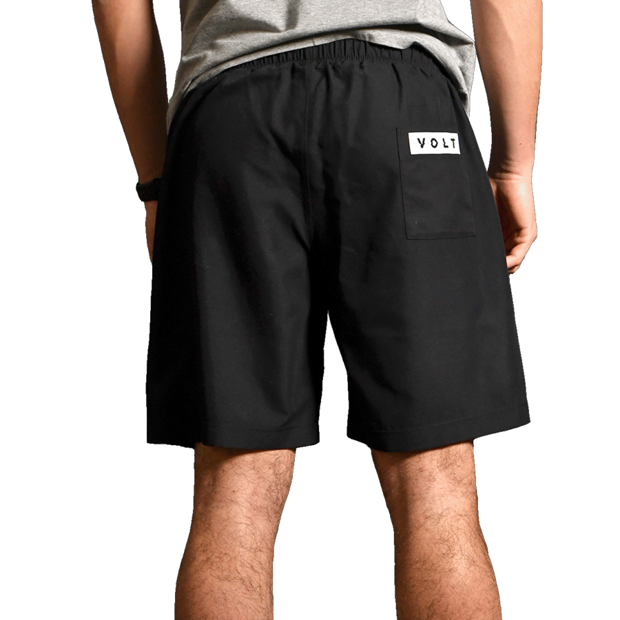 Back view of the Volt performance shorts in black, featuring the Volt logo on the rear pocket for a stylish finish.