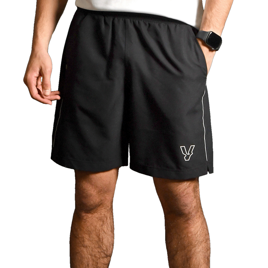 Front view of the Volt performance shorts in black, showcasing the Volt logo and sleek design with white piping.