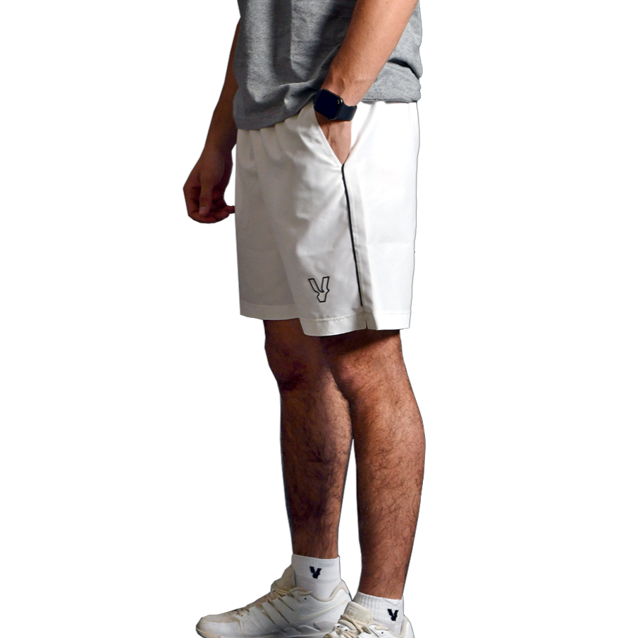 Side view of the Volt performance shorts in white, featuring a sleek design and Volt logo on the hem.