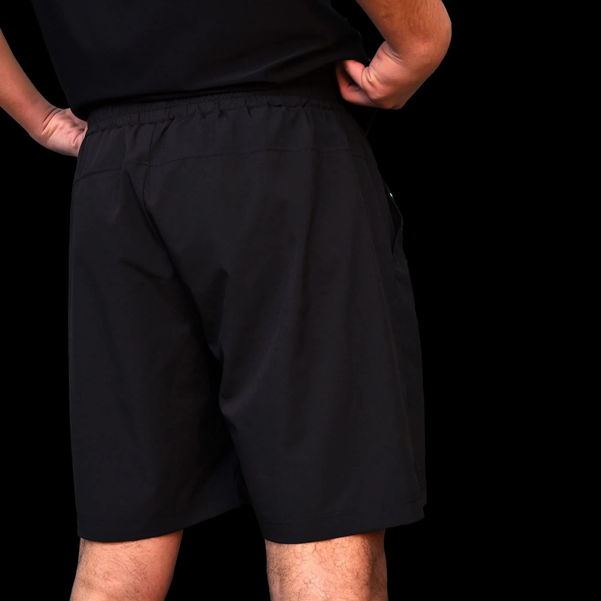 Volt Performance Shorts Black & Neon Green viewed from the back