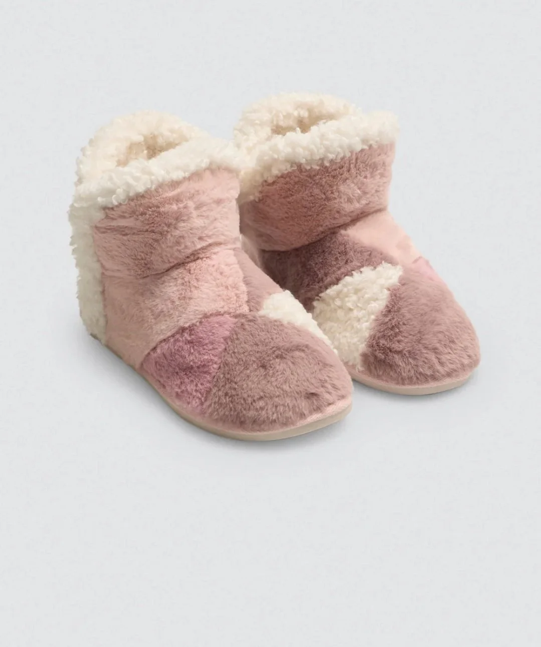 Furry pink home boots with colorful details