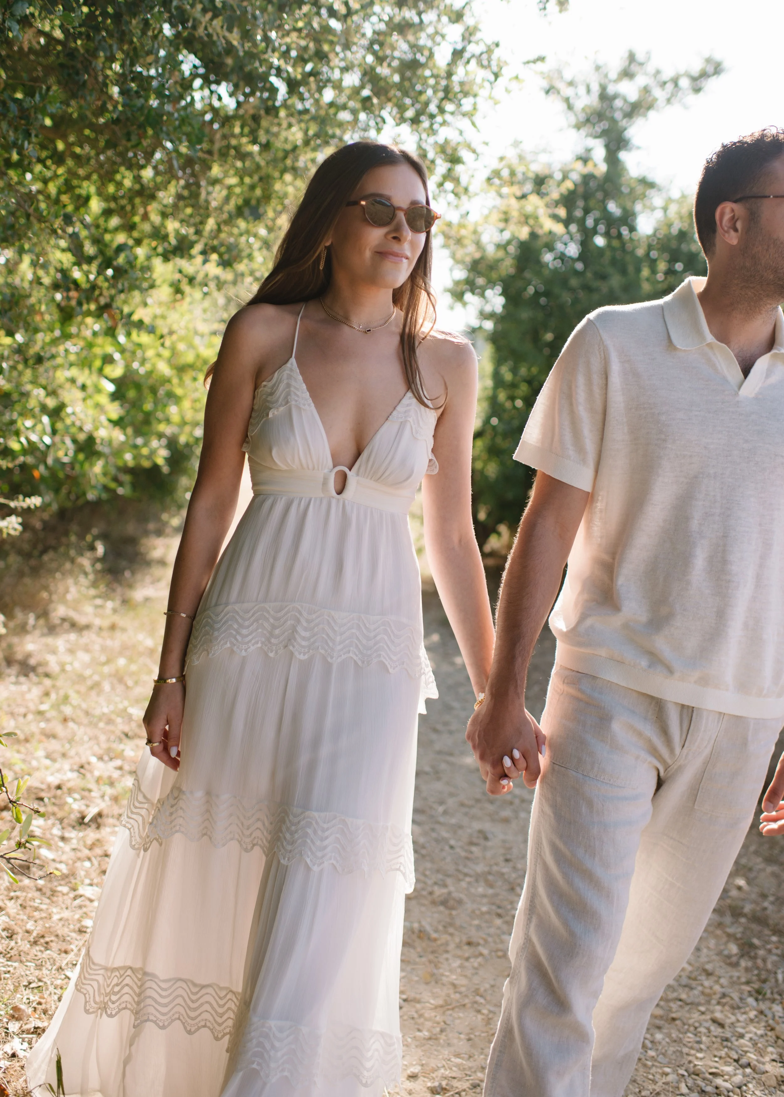 Relationship therapist in Los Angeles Rachel Neporent holding hands with her husband