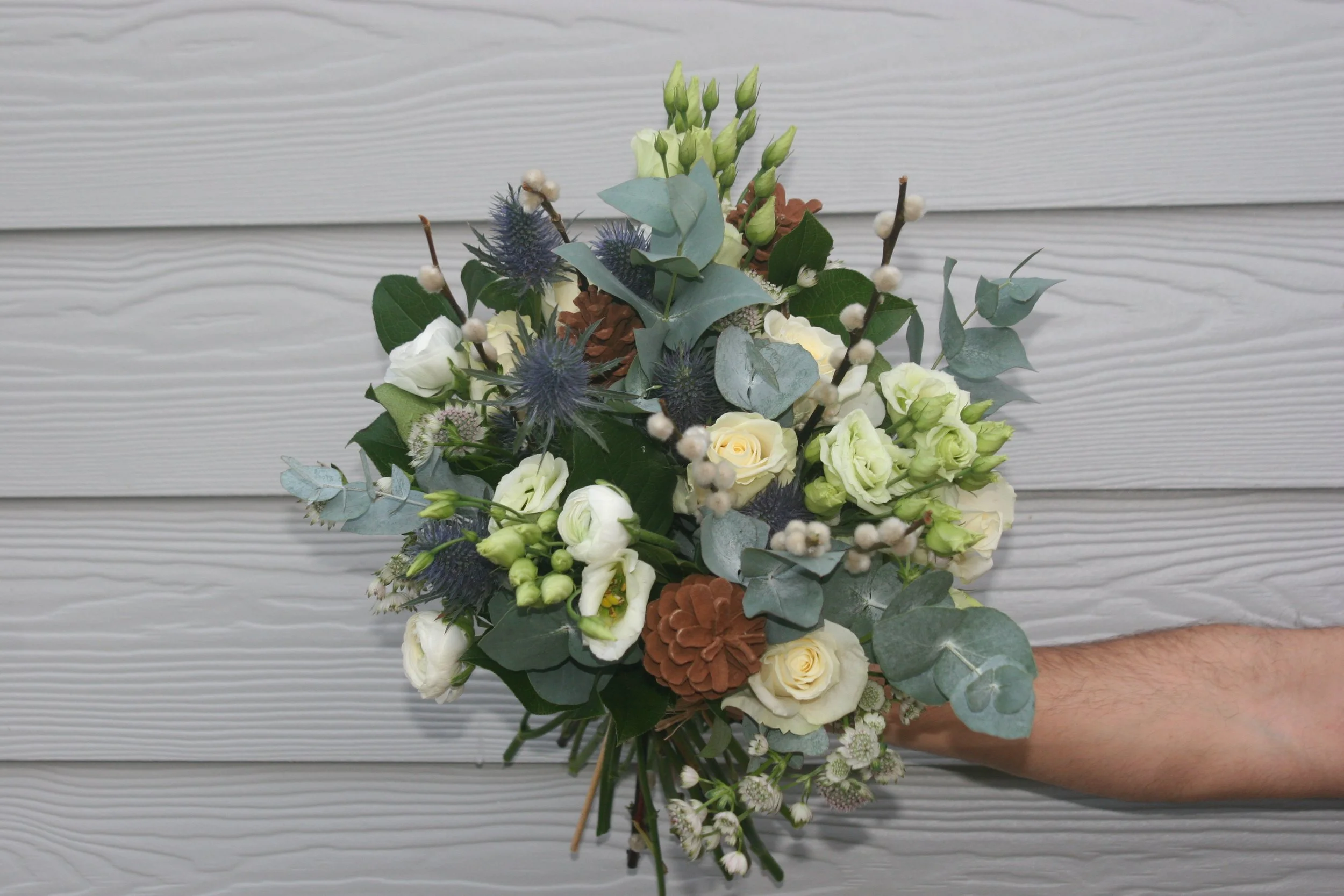 WHITE FESTIVE HAND-TIED BOUQUET