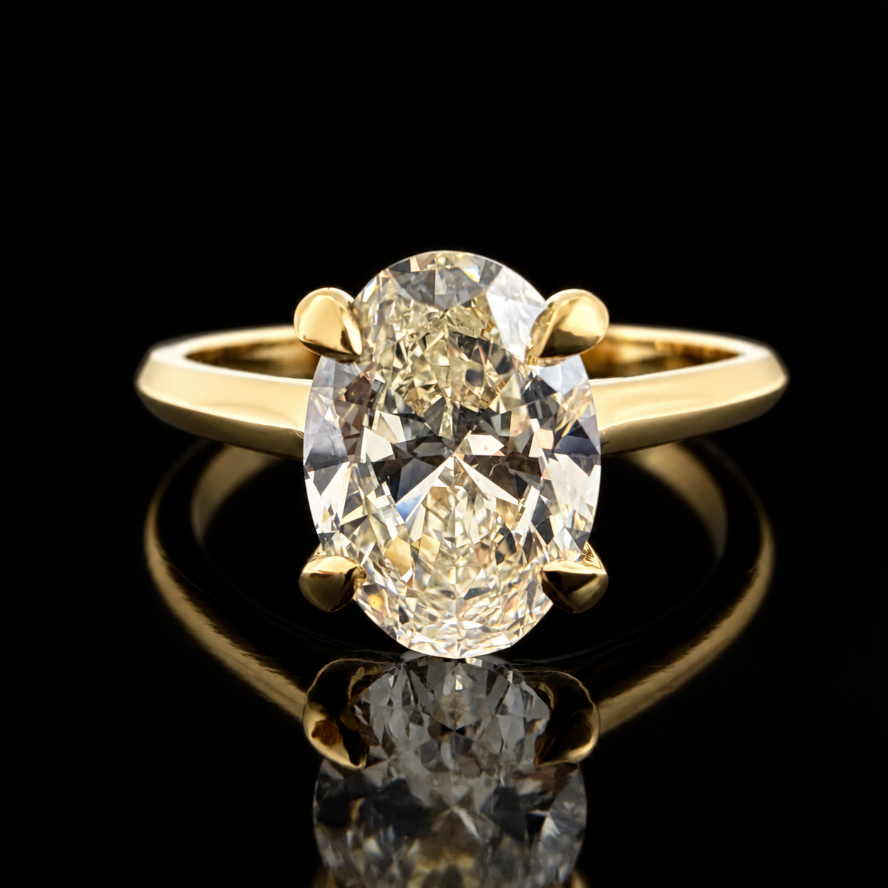 Oval Diamond Solitaire Ring on Black Reflection.png