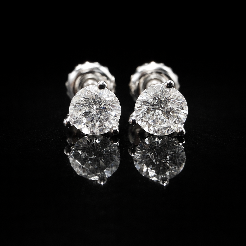 Sparkling diamond stud earrings on black (1).png