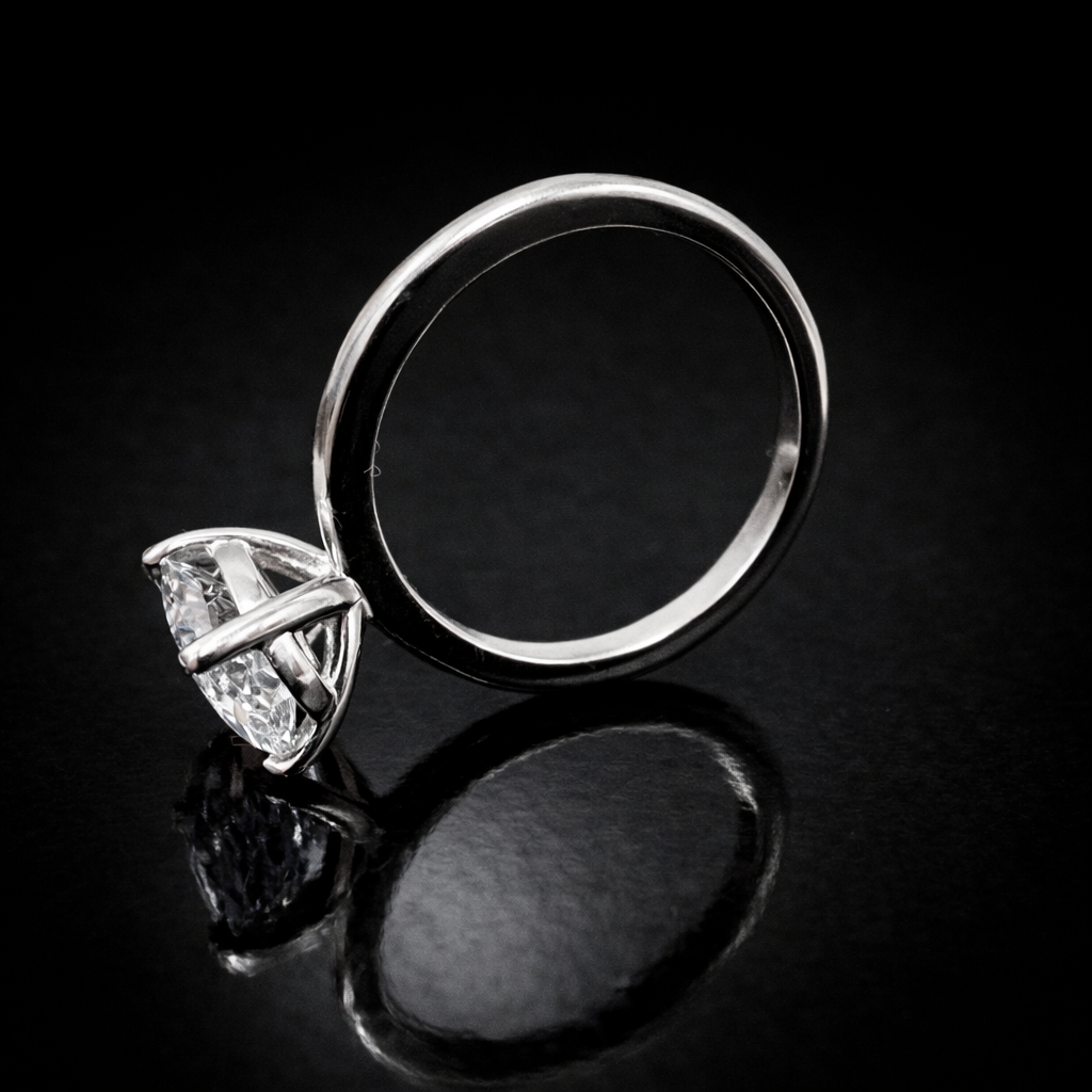 Elegant solitaire on black surface.png