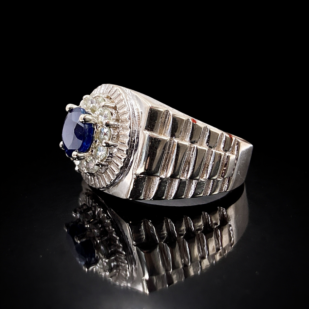 Elegant white gold sapphire ring.png