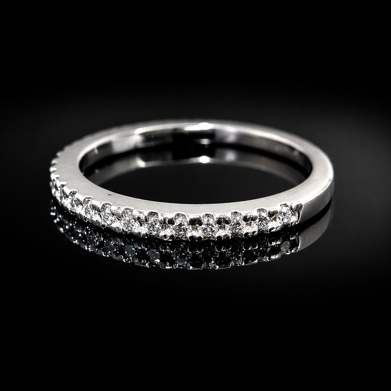 Elegant diamond eternity band reflection.png