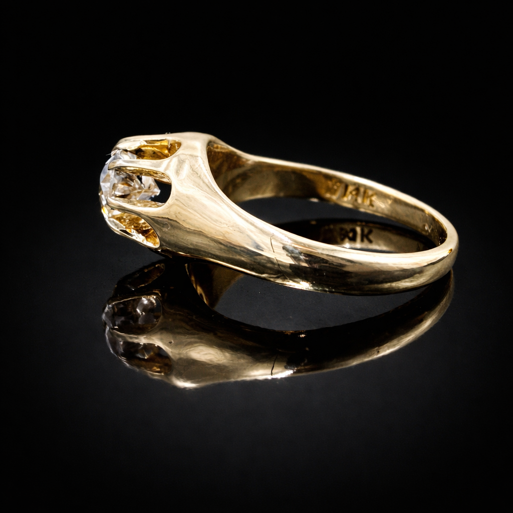 Elegant gold solitaire ring with diamond.png