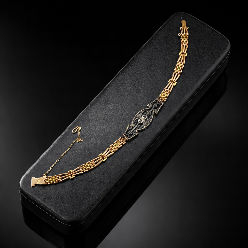 Elegant bracelet on black leather box.png