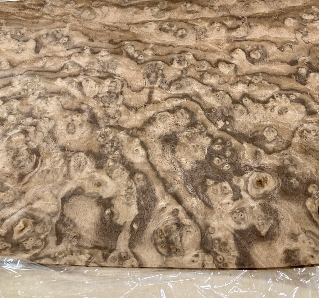 This unreal walnut burl veneer is the first ingredient for Secret Project No. 1. 

I will be working on this between commissions for the next few months, and it will be the culmination of the skills I have acquired over the last thirteen years. Gorge