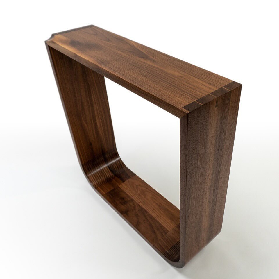 New console table in black walnut. Designed and built this for MARA&rsquo;s gallery in Sarasota.

Eroded dovetails are an idea I&rsquo;ve been kicking around for a while. They turned into eroded mitered dovetails here. I like the way they came out, a
