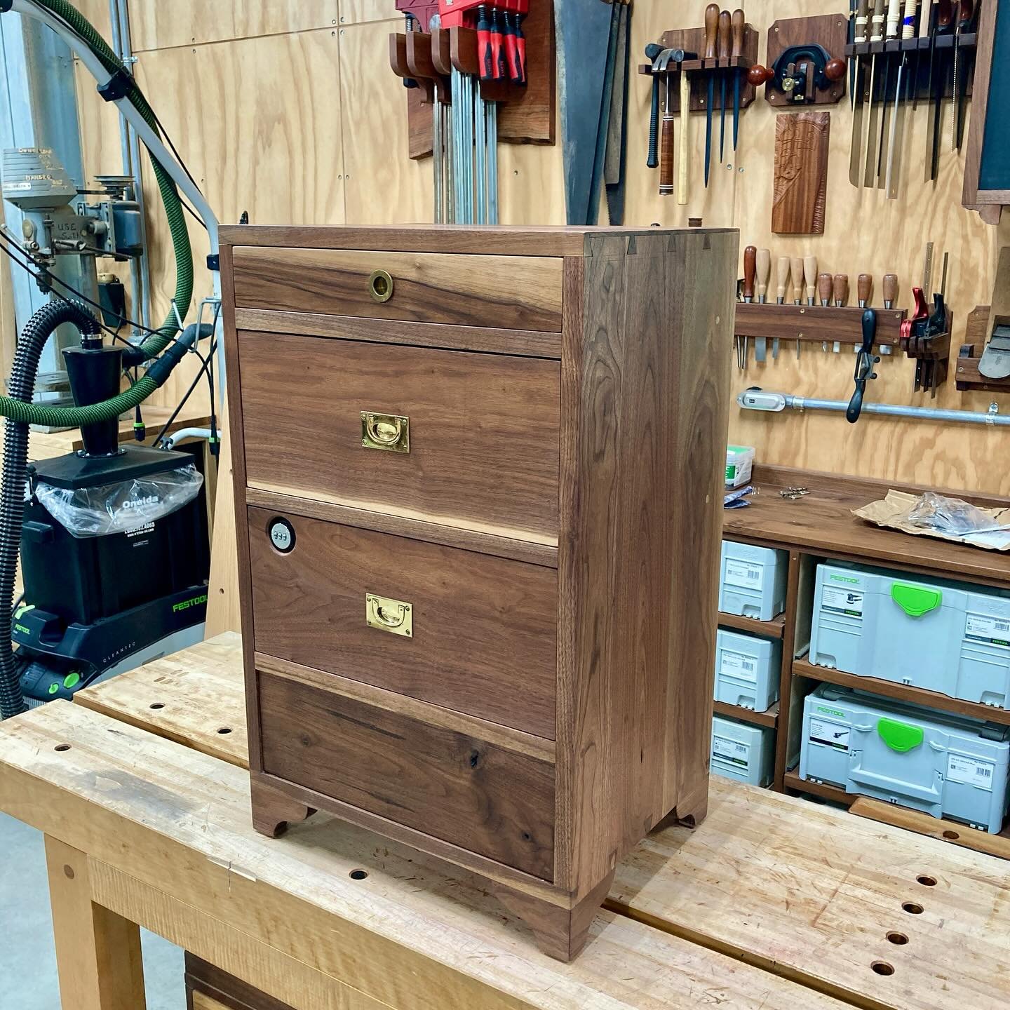 I refinished the exterior of a small chest I had built about ten years ago, when I was really into British campaign furniture. I could fill a page with all of the things wrong with it: clunky dovetails, subpar material, mismatched hardware, an obscen