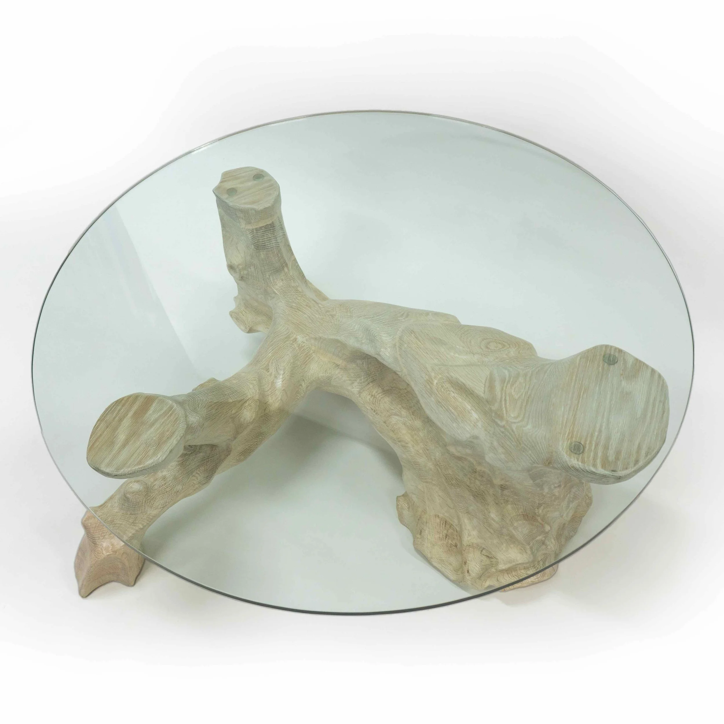 Drift Coffee Table in bleached white oak and glass top.