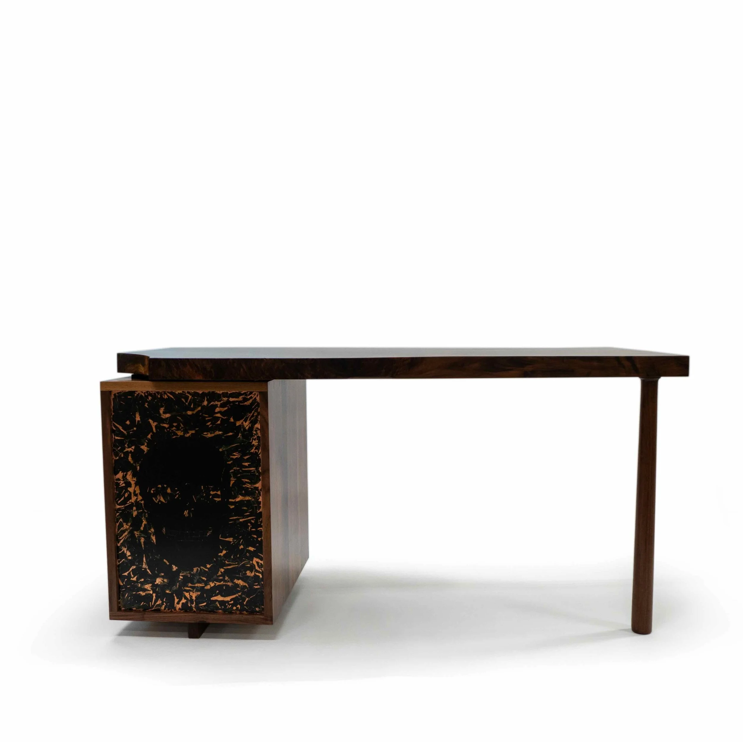 Back of Aurelius Desk in claro walnut slab and black walnut with patinated copper and skull.