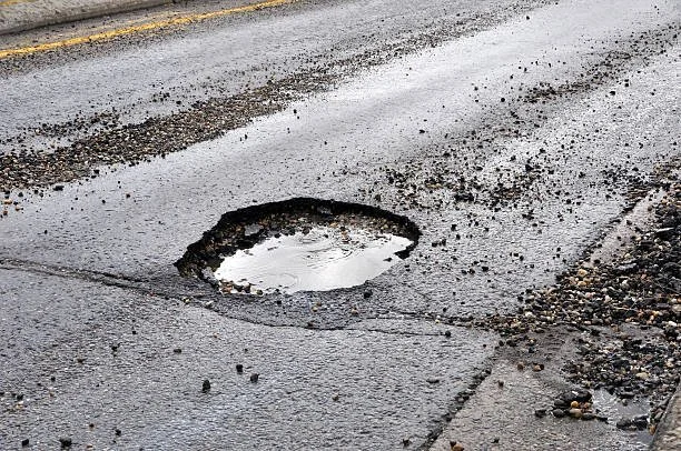 Flooding, potholes and river pollution